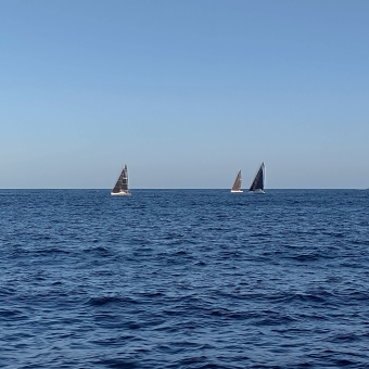 Racing Yachts, Betwixt The Heads, Sydney, with three yachts on the open water, with North Head and South and Head to the left and right some distance away from the yachts