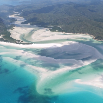 Hill Inlet, Hamilton Island, with an aerial shot of a shallow and windy river through sand dunes