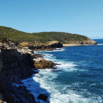 Noted Cliffs, Bouddi National Park, Killcare Heights, with many rippling cliffs over crashing water all extending into the distance